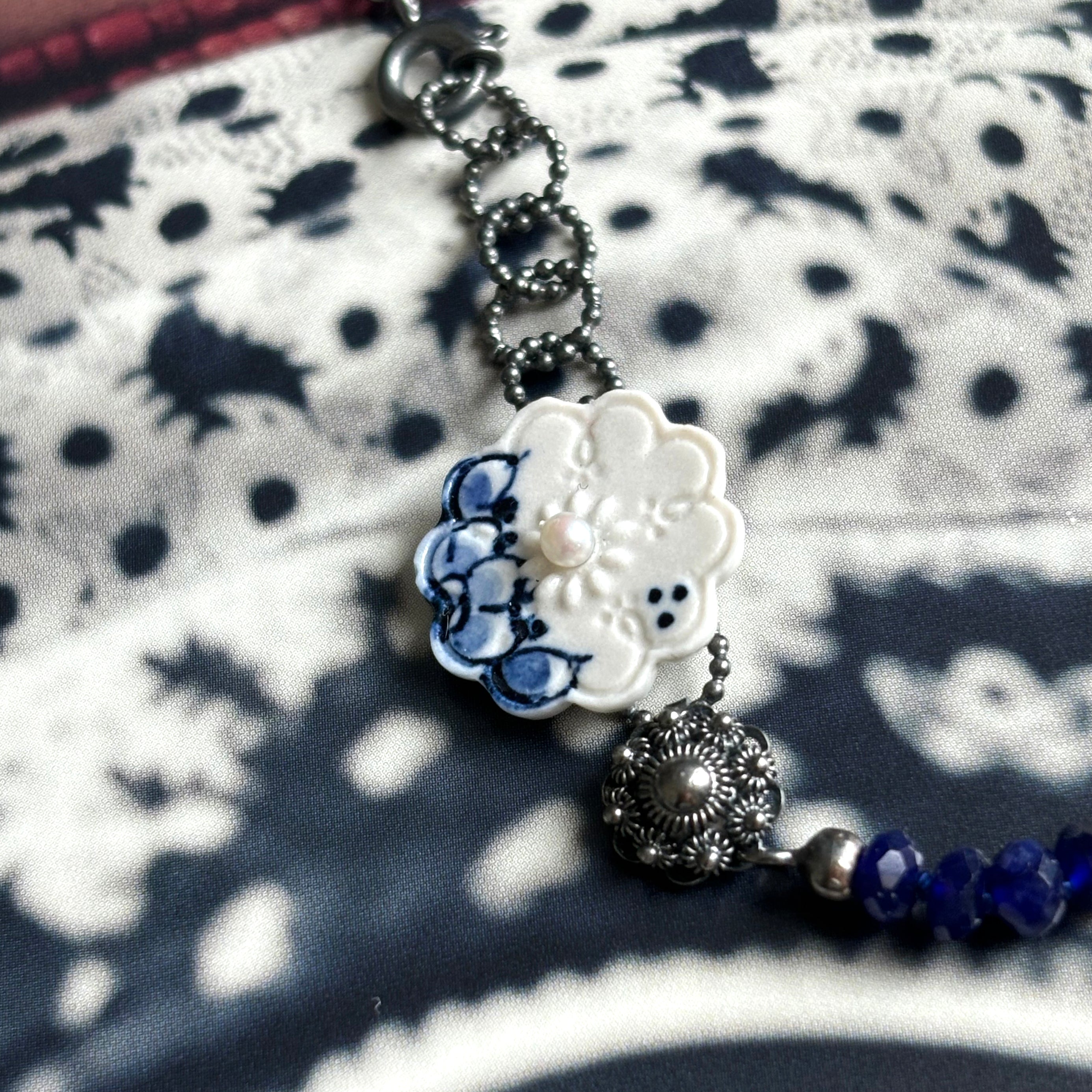 Delft Blue necklace, hand-painted blackened with sodalite